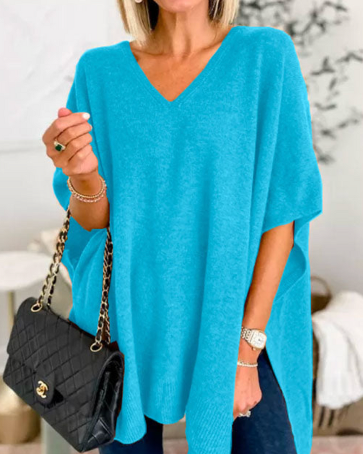 ERICA - Solid knit poncho with V-neck and wide cut